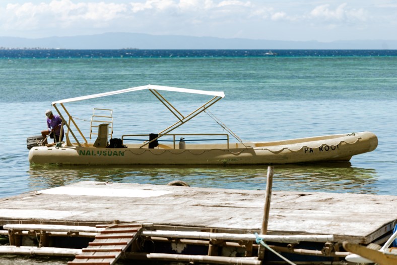 Rosh & Rachel Cebu Wedding, Cebu Wedding photographer, Nalusuan Island Cebu Wedding, a shot of Nalusuan Island's boat